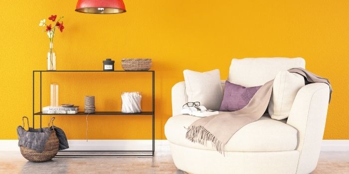 orange colored walls with matching furniture